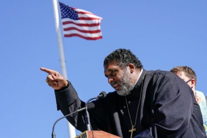 Rev. William Barber speaking in front of the US Supreme Court
