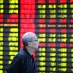 Asian stocks rally on renewed global rate cut optimism