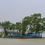 Marooned houses are seen during heavy rainfall in Patuakhali in Bangladesh on May 27  after a powerful cyclone