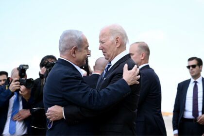 Israel Prime Minister Benjamin Netanyahu greets US President Joe Biden upon his arrival at Tel Aviv