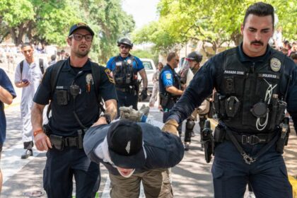 A pro-Palestinian protester is arrested at the University of Texas in Austin, Texas, on April 29, 2024.