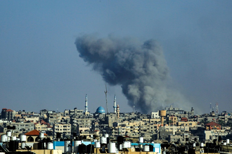 Smoke billows following Israeli bombardment in Rafah in the southern Gaza Strip on May 25, 2024