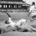 Josh Gibson slides into home plate