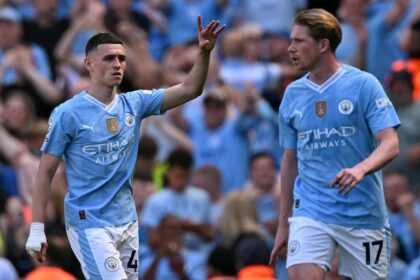 On the way: Manchester City's Phil Foden celebrates his second goal against West Ham at the Etihad