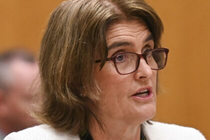 OECD calls for elevated interest rates, NDIS spending clampdown