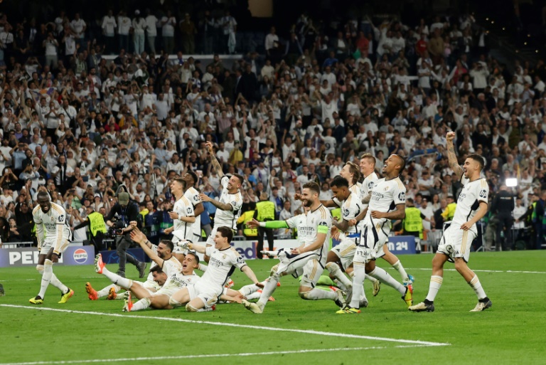 Real Madrid's players celebrate beating Bayern Munich at the Santiago Bernabeu to reach the Champions League final