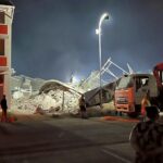 The five-storey building was flattened in the collapse trapping a construction crew