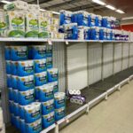 Near-empty shelves of toilet paper in a Melbourne supermarket