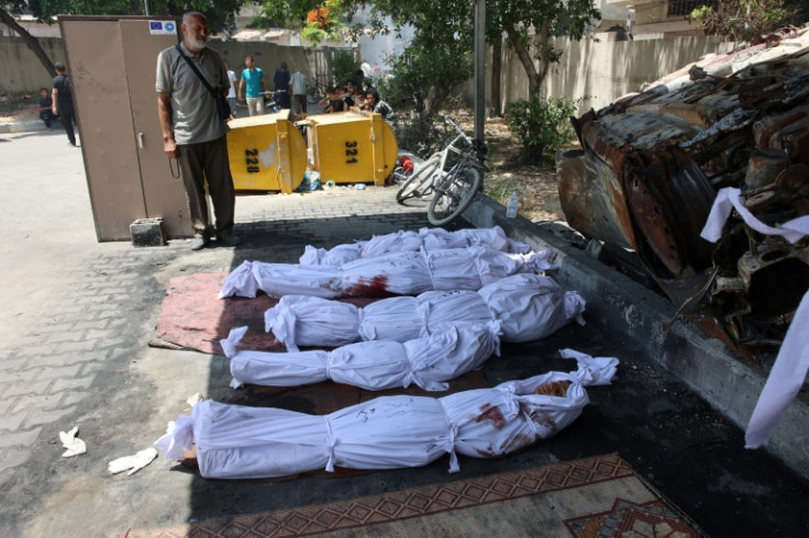 The bodies of Gazans killed in an Israeli strike lie ready for burial outside a clinic in Gaza City on May 25, 2024