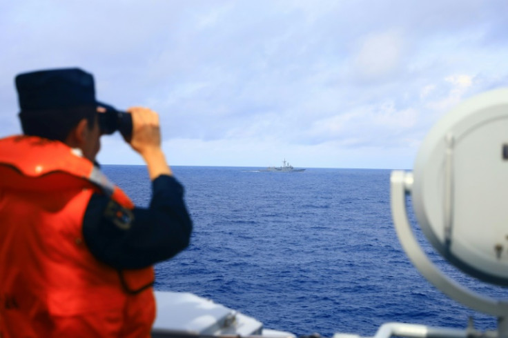 Chinese warships and fighter jets encircled Taiwan in drills that China said were a test of its ability to seize the island