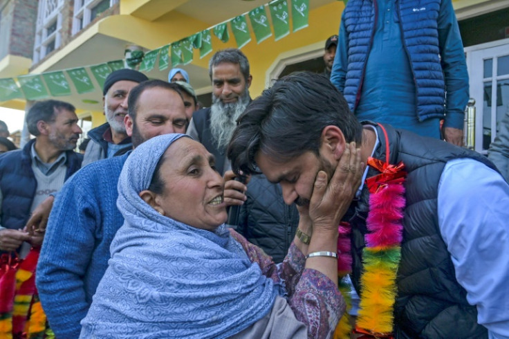 Parliamentary candidate Waheed Ur Rehman Para (R) says Kashmir's opposition parties feel a sense of solidarity due to Prime Minister Narendra Modi's policies in the region