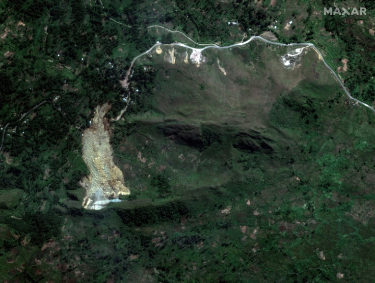 This handout satellite image taken and received on May 27, 2024 from Planet Labs PBC shows an overhead view of an area after a landslide that occured early on May 24, 2024 at Yambali village in the region of Maip Mulitaka, in Enga Province, Papua New Guin