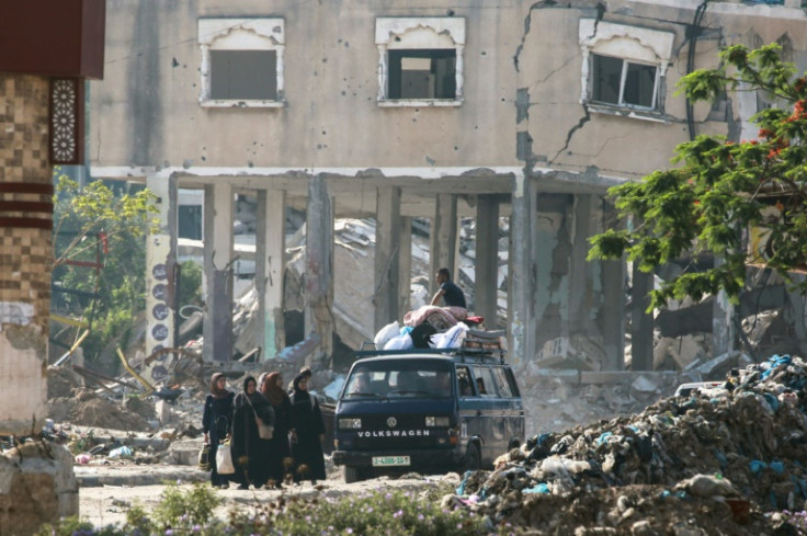 Palestinian civilians flee central Gaza areas near al-Bureij amid Israeli bombardment on June 5, 2024