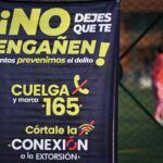A poster in a crime-hit neighborhood of Bogota, urging people to report extortion attempts