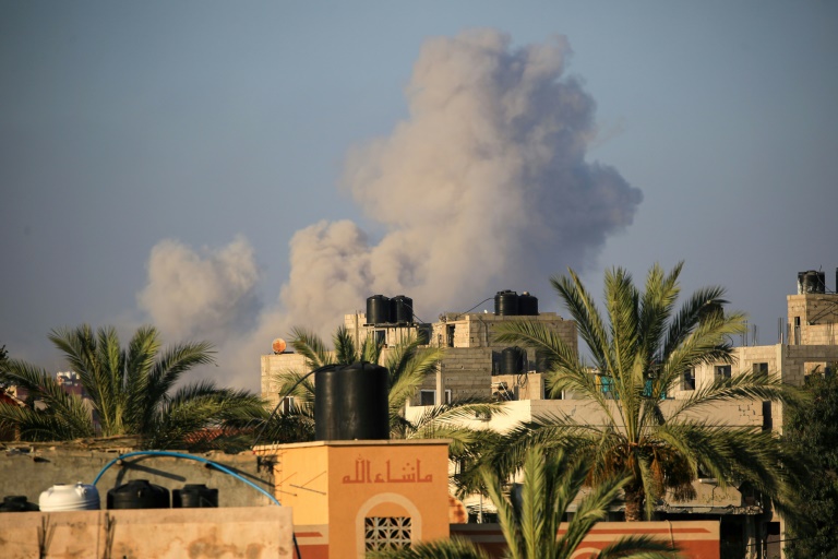 Smoke billows following an Israeli strike south of Gaza City on June 11, 2024