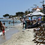 Deckchairs and sunbeds taking off almost all of a beach on the Halkidiki peninsula in northern Greece