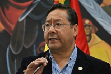 Bolivian President Luis Arce talks to the media during a press conference in La Paz