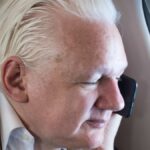 Julian Assange touches down on Australian soil after guilty plea