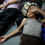 Palestinian children receive malnourishment treatment at Al-Aqsa Martyrs Hospital in Deir al-Balah