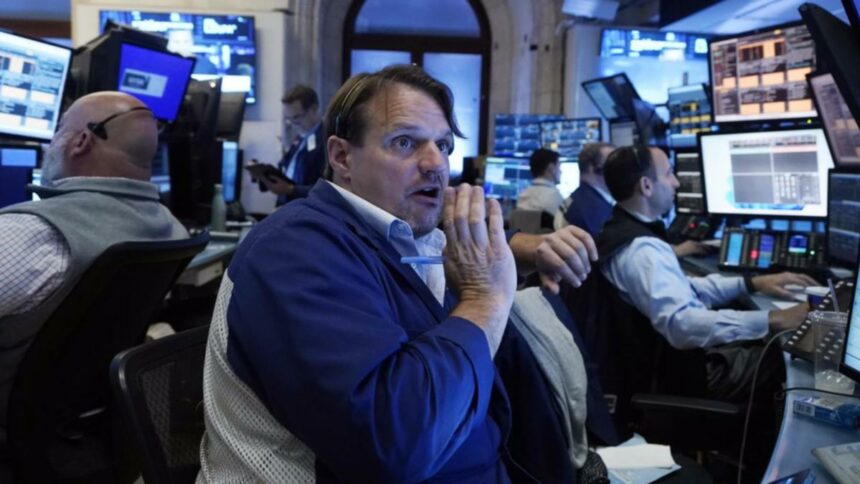 Wall St ends lower as investors digest inflation data