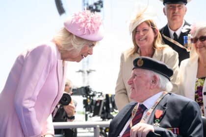 Why Queen Camilla Wore Head-to-Toe Pink at D-Day Event with King Charles and Prince William