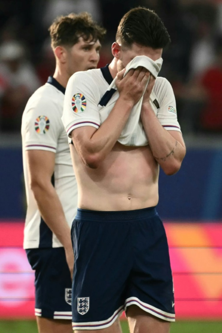 Declan Rice (right) believes England are struggling with the pressure of being among the favourites for Euro 2024