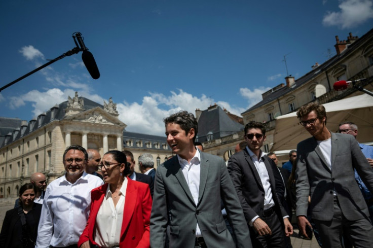 French Prime Minister Gabriel Attal walks during a campaign visit to the city of Dijon, eastern France