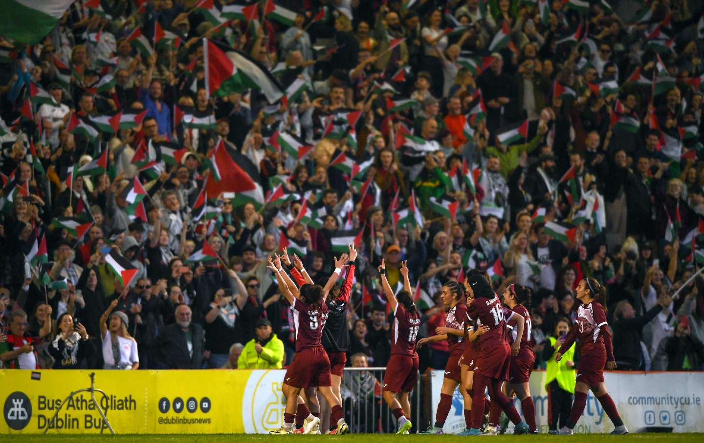 Palestine players celebrate after Nour Youseff of Palestine scores her side's second during the international solidarity match between Bohemians and Palestine at Dalymount Park in Dublin on May 15, 2024.