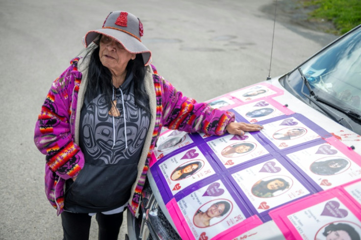 Gladys Radek, advocate for missing Indigenous women, displays the images plastered across the van she drives to visit communities along the "Highway of Tears"