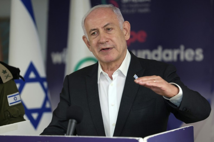 Israeli Prime Minister Benjamin Netanyahu speaks at the hospital treating the four rescued hostages