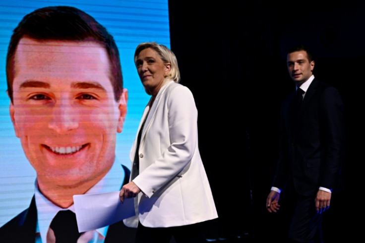 The Rassemblement National party's 28-year-old president Jordan Bardella (R) is tipped to become France's first far-right prime minister