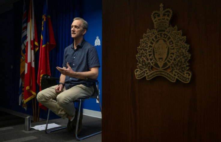 RCMP Constable Wayne Clary, shown here speaking in Surrey, British Columbia in May, says that with some of the activities that women engage in, "they make themselves available for men who prey on women"