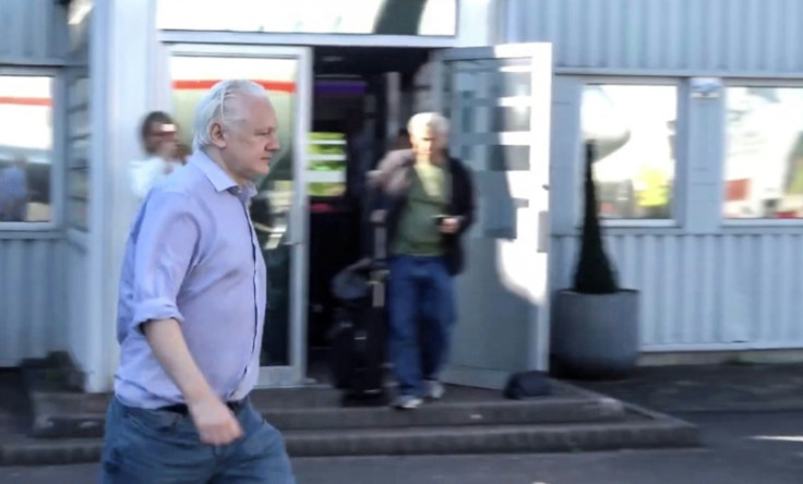 This screenshot courtesy of WikiLeaks's X page shows Julian Assange walking to board a plane from London Stansted Airport on June 24, 2024