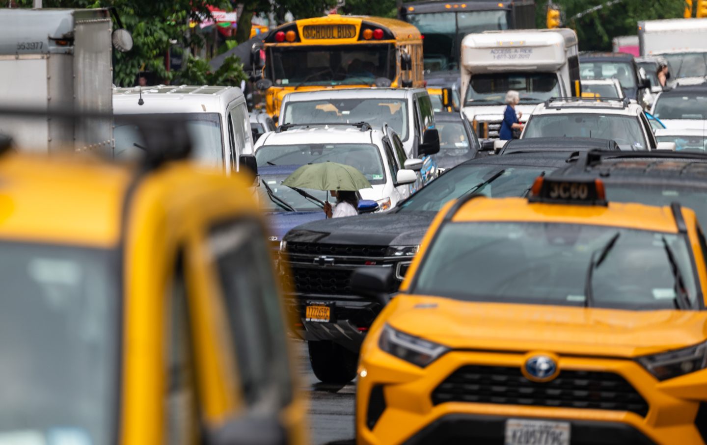 Cars move slowly through traffic in midtown Manhattan on June 6, 2024.