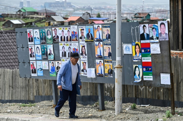 Voters across the vast, sparsely-populated nation of 3.4 million are electing 126 members of the State Great Khural, a democratic exercise in a country surrounded by authoritarian powers China and Russia