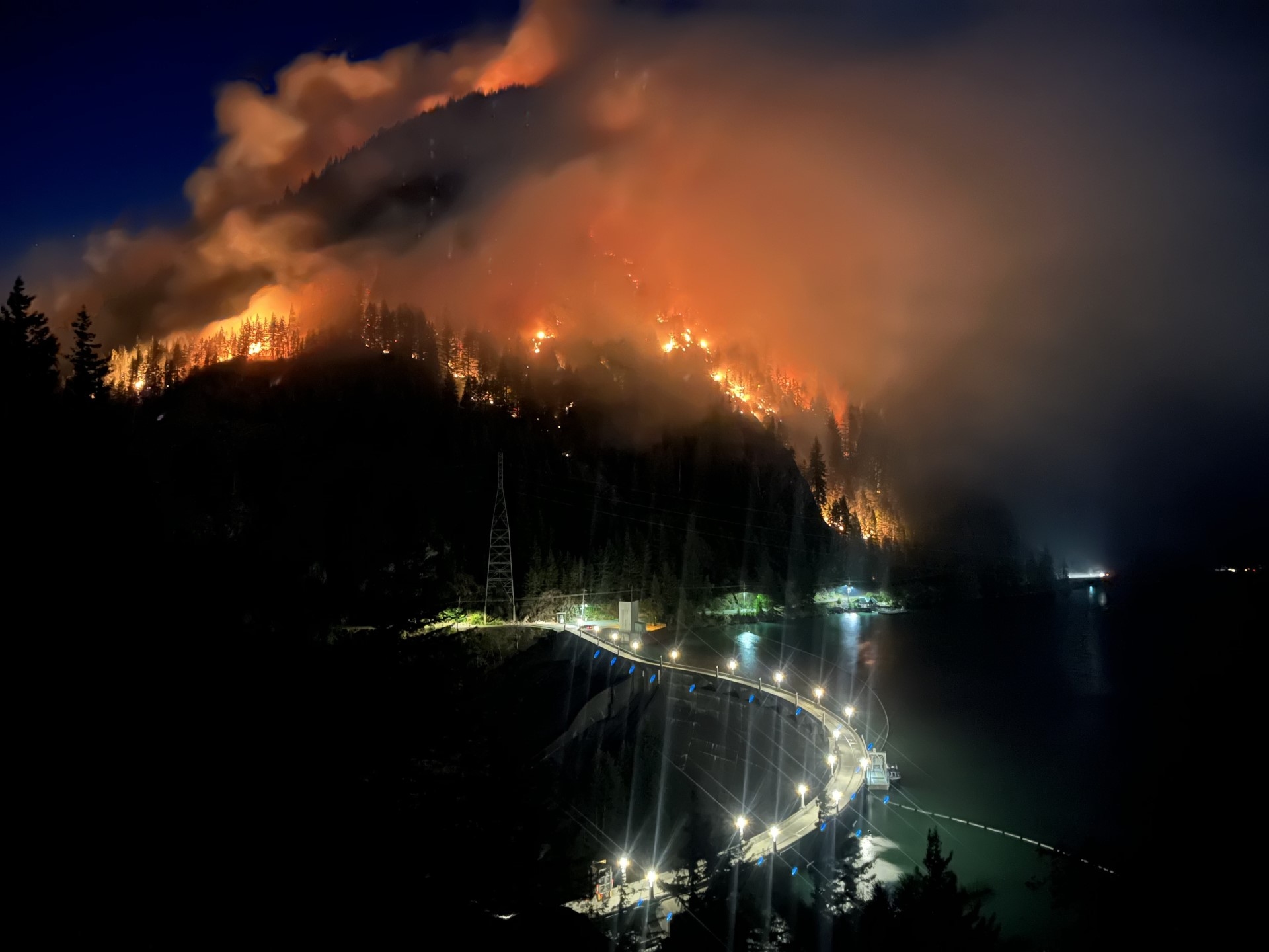 Sourdough Wildfire threatening Diablo dam on August 8, 2023, much like the Goodell Creek fire that forced SCL to shut down the project and spill water over Gorge dam.