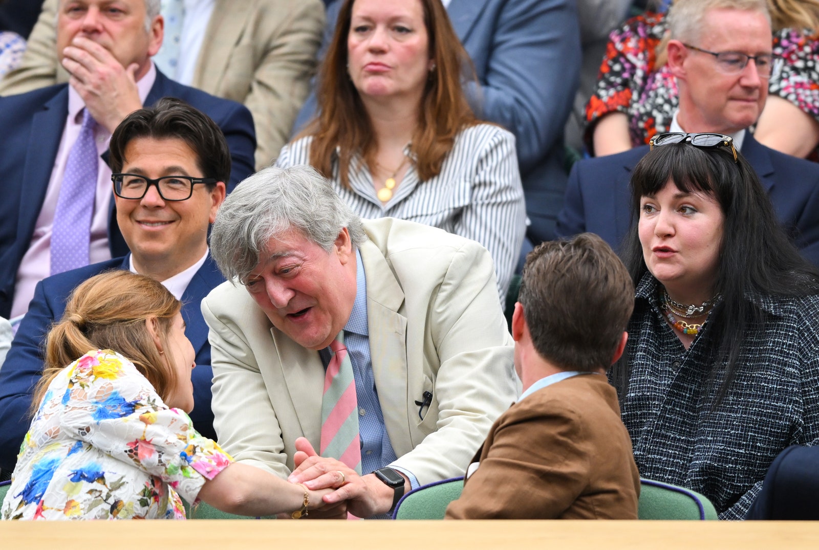 Image may contain Stephen Fry Michael McIntyre Lena Dunham Accessories Formal Wear Tie Adult Person Head and Face