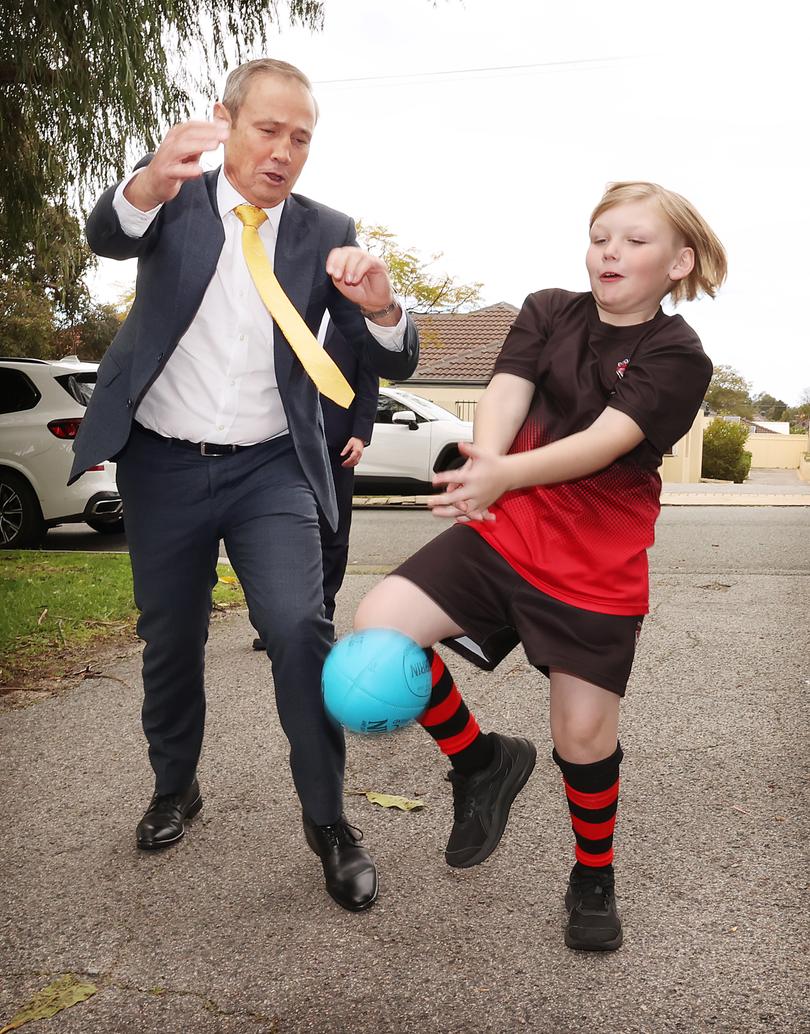 News. Premier Roger Cook provides an update on the Household Electricity Credit rollout. Premier Roger Cook playing football with Zeb Dunstan 8. Jackson Flindell