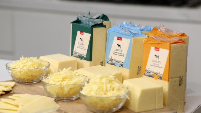 Coles has reduced the cost of their popular 1kg block of cheese. Martin Keep