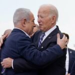President Joe Biden is greeted by Israeli Prime Minister Benjamin Netanyahu after arriving at Ben Gurion International Airport, Oct. 18, 2023, in Tel Aviv.