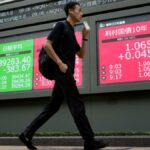 Asia stocks stutter, euro gains after France election