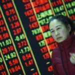 Asian shares fall as China drags, dollar in demand