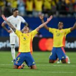 Colombia midfielder Kevin Castano team-mate Yerry Mina celebrate their team's semi-final victory over Uruguay in the Copa America