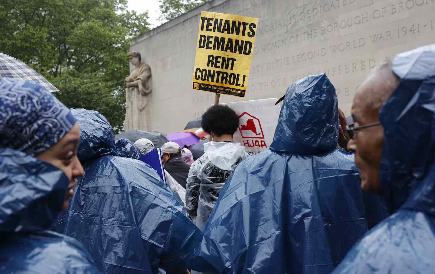 Community organizations and tenants hold a rally to protest against the rising costs of rental apartments in New York City, May 20, 2023, in Brooklyn.