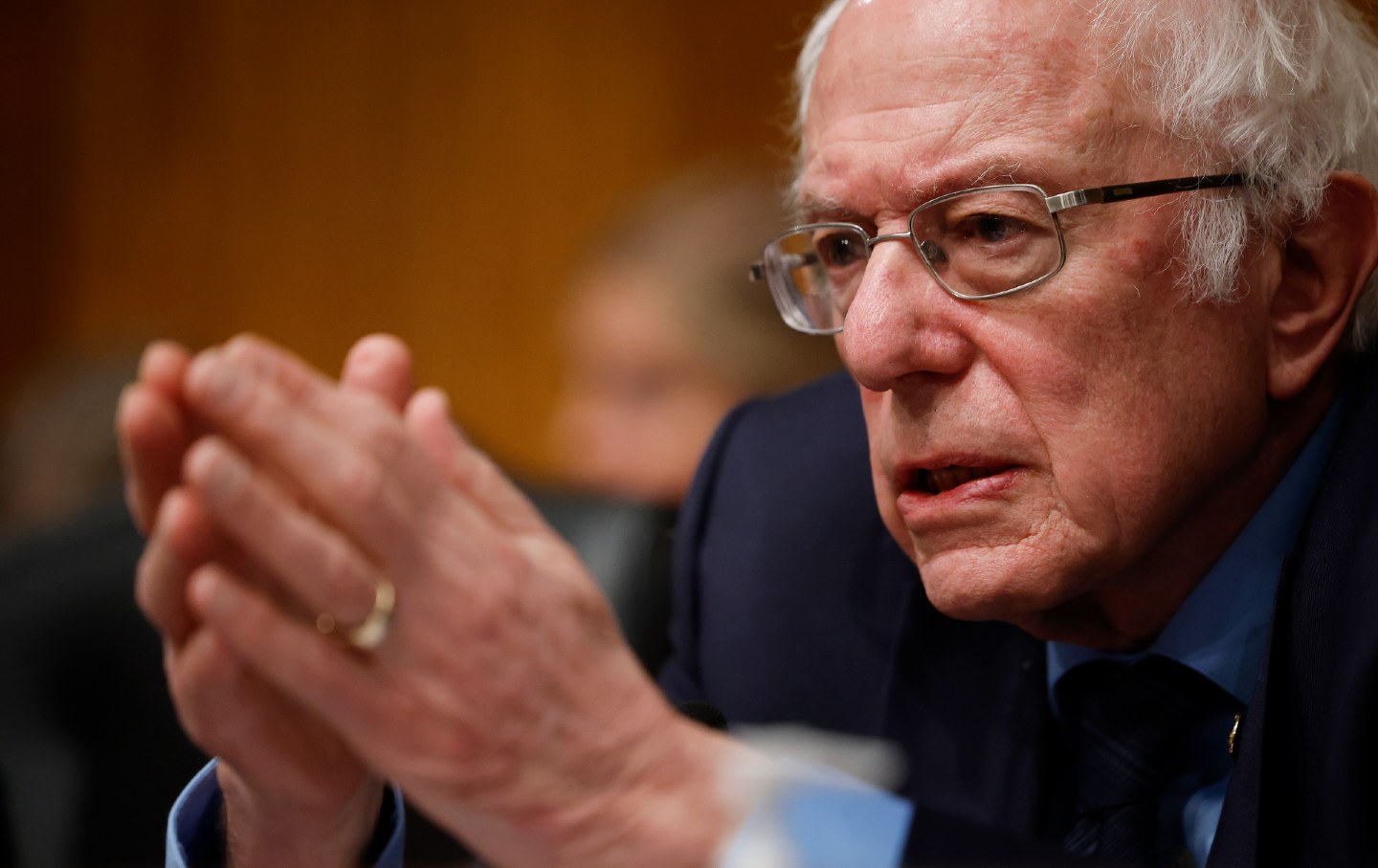Bernie Sanders (I-VT) questions witnesses during a hearing about working hours in the Dirksen Senate Office Building on Capitol H