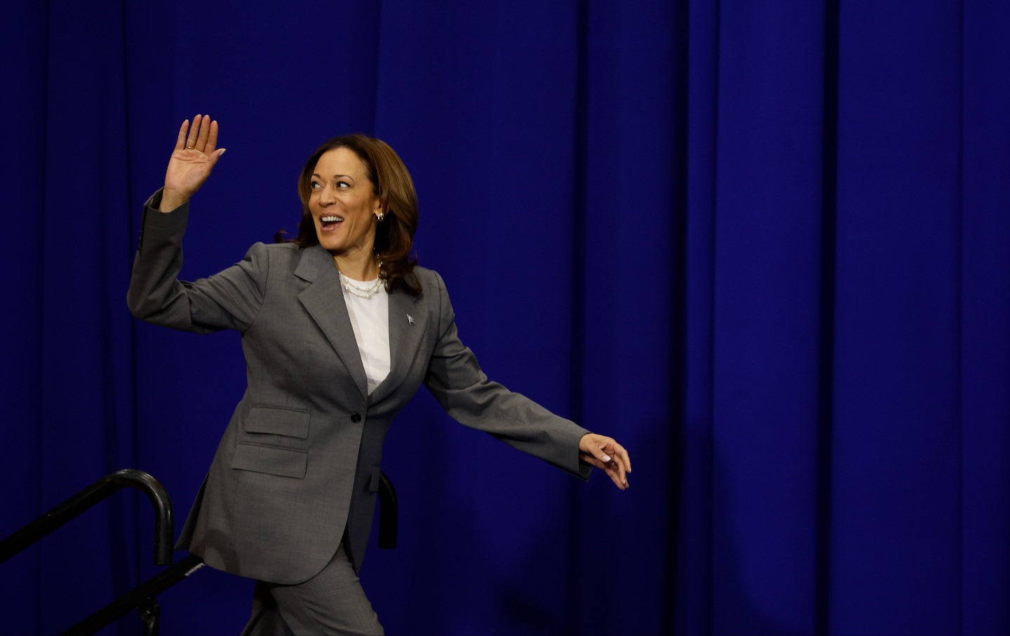 Kamala Harris waves as she arrives on stage to deliver remarks on reproductive rights at Ritchie Coliseum on the campus of the University of Maryland on June 24, 2024 in College Park, Maryland.