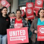 Health workers and education assistants strike outside Albany Health Campus to demand higher pay rise