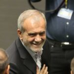 Iran president sworn in, aims to have sanctions lifted
