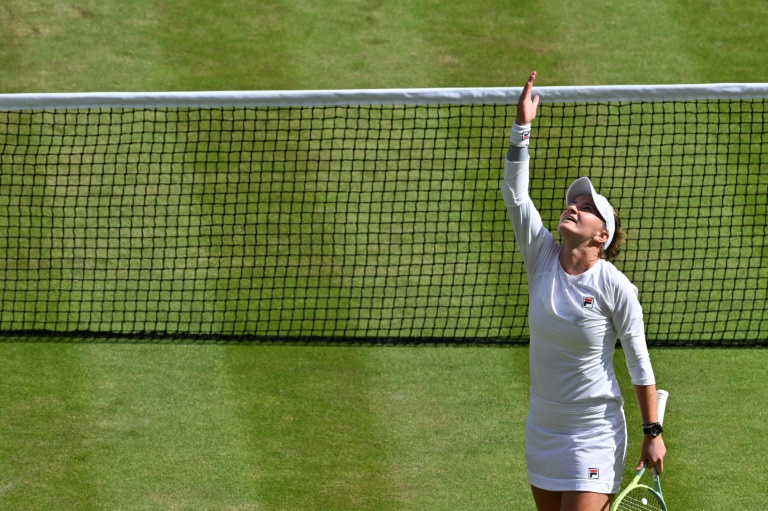 Barbora Krejcikova celebrates winning the Wimbledon title