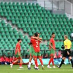 Morocco players celebrate at the end of a chaotic Olympic men's football match